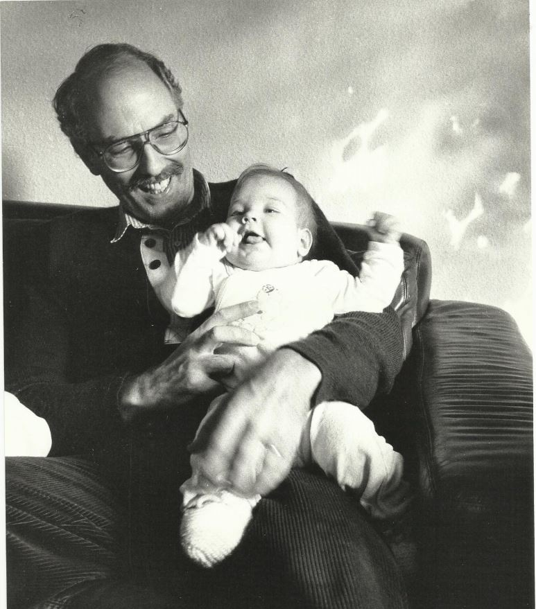 father with baby on the lap